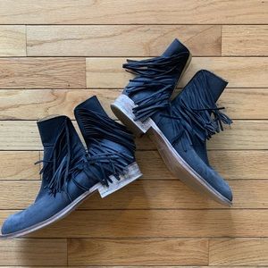 Ankle cut-out fringe leather bootie